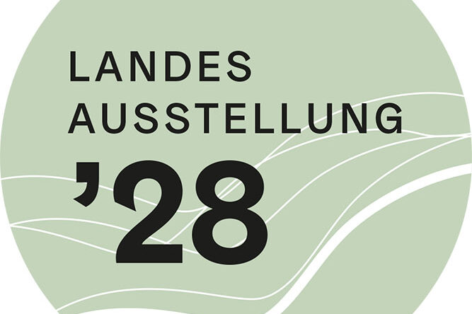 hellgrünes rundes Logo mit schwarzer Schrift - Landesausstellung ´28