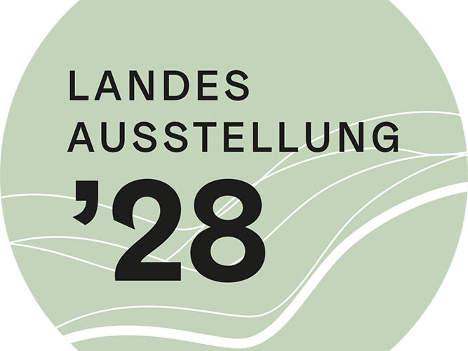 hellgrünes rundes Logo mit schwarzer Schrift - Landesausstellung ´28